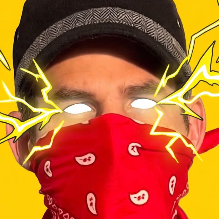 The artist’s glowing white eyes under the cap, lightning cracking out to both sides